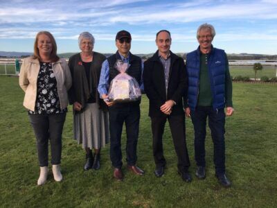Mark Law (centre) in Southland following Chitura’s Southern Belle win in 2019